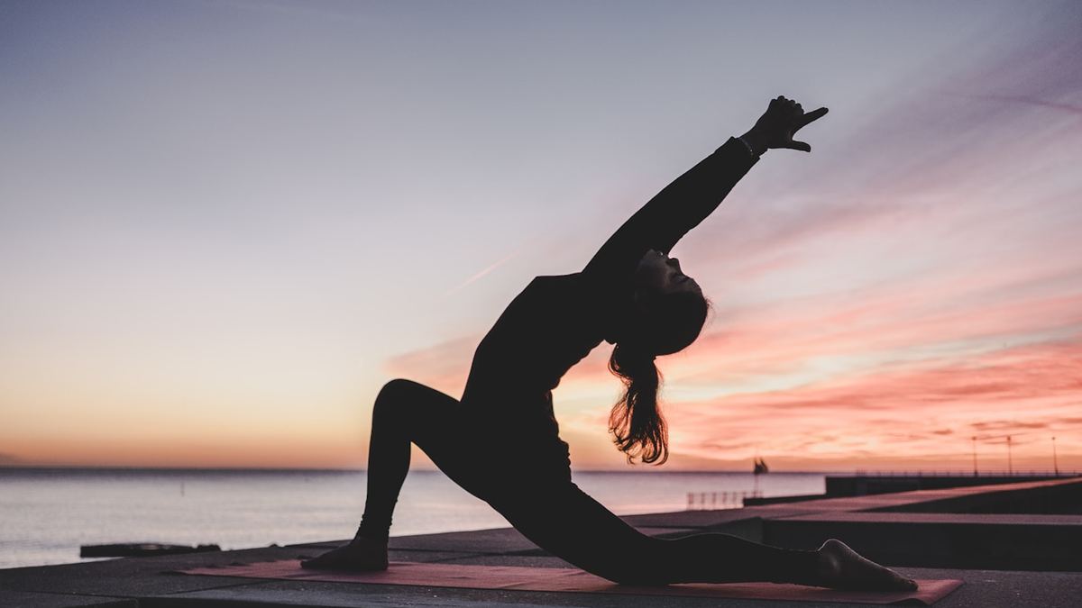 Yoga al amanecer en El Retiro